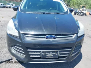 2014 Ford Escape SE with VIN 1FMCU9GX9EUA18422, listed as a IAAI auction lot 42765689 with 153,235 mi miles and . Bid and sale history available at DreamBid. Image 6.