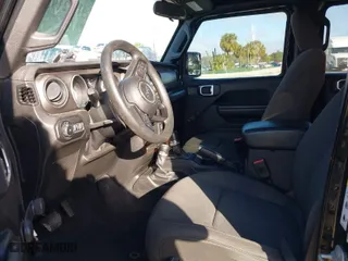 2018 Jeep Wrangler Unlimited Sport S with VIN 1C4HJXDG9JW159307, listed as a IAAI auction lot 41142193 with 57,185 mi miles. Bid and sale history available at carsss.com. Image 5.