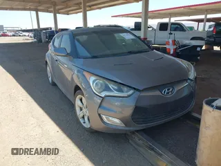 2014 Hyundai Veloster RE:FLEX z VIN KMHTC6AD2EU197984, wystawiony jako IAAI lot #41721931 z przebiegiem 107 252 mil mil oraz . Historia ofert i sprzedaży dostępna na DreamBid. Obrazek 1.