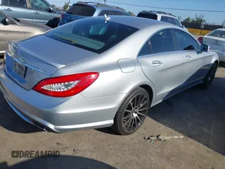 2014 Mercedes-Benz CLS 550 with VIN WDDLJ7DB0EA104042, listed as a IAAI auction lot 42643727 with 96,841 mi miles and . Bid and sale history available at DreamBid. Image 4.