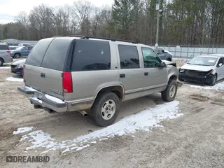 1998 Chevrolet Tahoe with VIN 1GNEK13R4WJ346417, listed as a IAAI auction lot 41390436 with 184,094 mi miles. Bid and sale history available at carsss.com. Image 4.