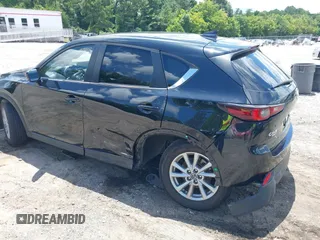2023 Mazda CX-5 S Carbon Edition z VIN JM3KFBCMXP0201665, wystawiony jako IAAI lot #39965378 z przebiegiem 29 105 mil mil oraz . Historia ofert i sprzedaży dostępna na DreamBid. Obrazek 6.