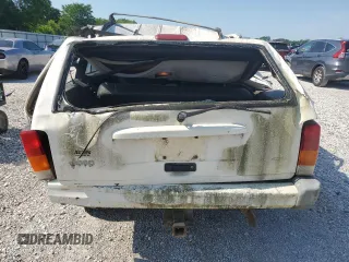 1999 Jeep Cherokee Sport z VIN 1J4FF68S3XL597049, wystawiony jako Copart lot #58736325 z przebiegiem 134 684 mil mil oraz Nie do naprawy • Non repairable. Historia ofert i sprzedaży dostępna na DreamBid. Obrazek 6.
