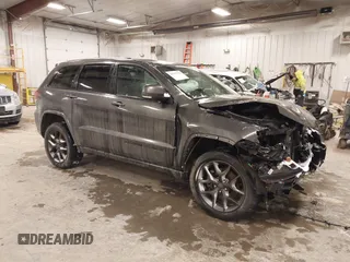 2021 Jeep Grand Cherokee 80th Anniversary z VIN 1C4RJFBG2MC736010, wystawiony jako IAAI lot #41355729 z przebiegiem 45 588 mil mil oraz . Historia ofert i sprzedaży dostępna na DreamBid. Obrazek 1.
