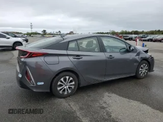 2021 Toyota Prius LE z VIN JTDKAMFP1M3172737, wystawiony jako Copart lot #57056205 z przebiegiem Nie podano mil oraz Szkoda całkowita • Salvage title. Historia ofert i sprzedaży dostępna na DreamBid. Obrazek 3.