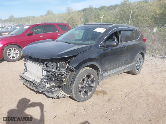 2017 Honda CR-V Touring with VIN 5J6RW2H96HL037854, listed as a IAAI auction lot 40472748 with 126,582 mi miles. Bid and sale history available at carsss.com. Image 17.