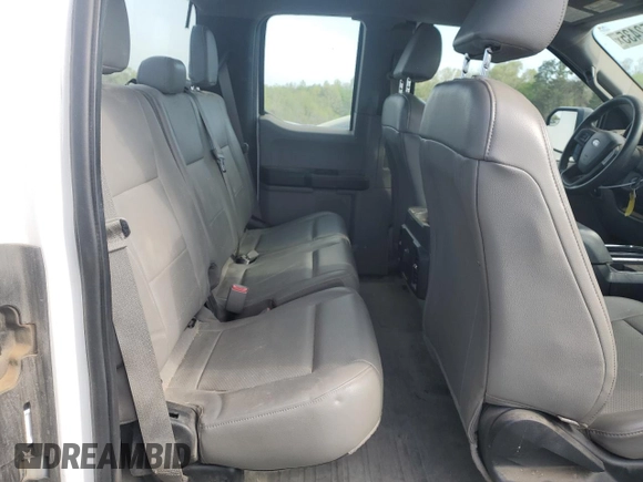 2015 Ford F-150 XL with VIN 1FTEX1C80FFB62967, listed as a Copart auction lot 52552435 with 154,977 mi miles and Salvage title. Bid and sale history available at DreamBid. Image 10.