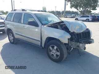 2007 Jeep Grand Cherokee Laredo z VIN 1J8GR48K87C575899, wystawiony jako IAAI lot #42353019 z przebiegiem 149 174 mil mil oraz . Historia ofert i sprzedaży dostępna na DreamBid. Obrazek 1.