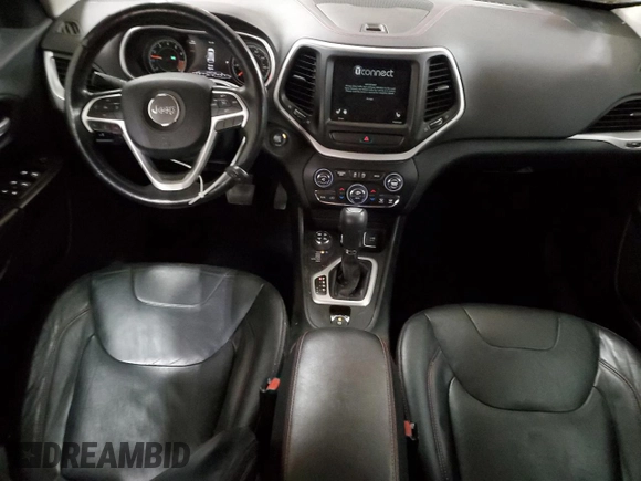 2015 Jeep Cherokee Trailhawk z VIN 1C4PJMBS9FW509642, wystawiony jako Copart lot #52385555 z przebiegiem 135 477 mil mil oraz Szkoda całkowita • Salvage title. Historia ofert i sprzedaży dostępna na DreamBid. Obrazek 8.