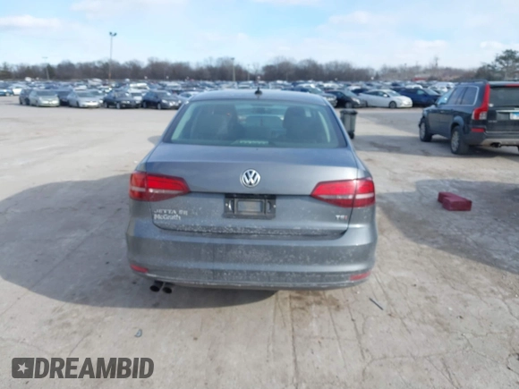 2016 Volkswagen Jetta Sedan 1.4T SE with VIN 3VWD67AJ7GM281671, listed as a IAAI auction lot 41385896 with 153,168 mi miles. Bid and sale history available at carsss.com. Image 16.