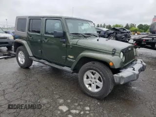 2007 Jeep Wrangler Unlimited Sahara z VIN 1J4GA59127L106988, wystawiony jako Copart lot #59750975 z przebiegiem 154 233 mil mil oraz Czysty tytuł • Clean title. Historia ofert i sprzedaży dostępna na DreamBid. Obrazek 4.