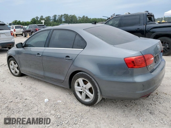 2014 Volkswagen Jetta TDI w/Premium with VIN 3VWLL7AJ9EM267112, listed as a Copart auction lot 58163545 with 106,367 mi miles and Clean title. Bid and sale history available at DreamBid. Image 2.