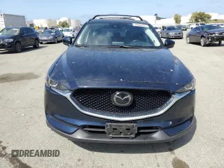2018 Mazda CX-5 Touring with VIN JM3KFACM6J1323449, listed as a Copart auction lot 54090445 with 93,748 mi miles and Salvage Title. Bid and sale history available at carsss.com. Image 5.