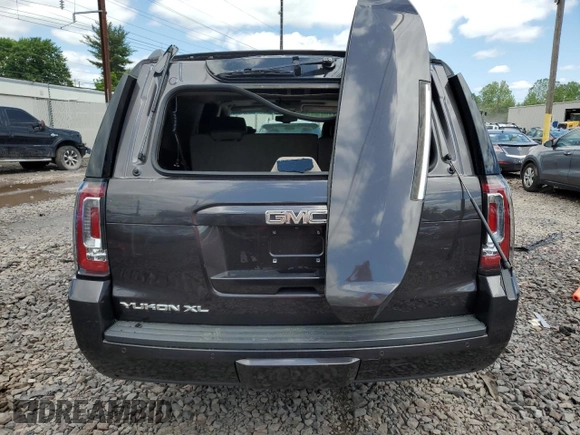 2015 GMC Yukon XL SLT z VIN 1GKS2HKC5FR121589, wystawiony jako Copart lot #57199505 z przebiegiem 200 753 mil mil oraz Szkoda całkowita • Salvage title. Historia ofert i sprzedaży dostępna na DreamBid. Obrazek 6.
