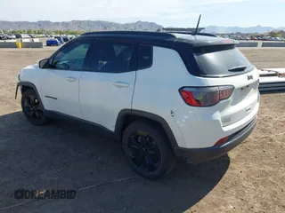 2018 Jeep Compass Latitude with VIN 3C4NJCBB3JT462141, listed as a IAAI auction lot 42024920 with 84,988 mi miles and . Bid and sale history available at DreamBid. Image 3.