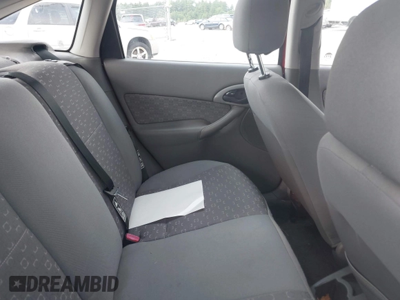 2003 Ford Focus with VIN 3FAFP37Z03R176259, listed as a IAAI auction lot 42720167 with 121,959 mi miles and . Bid and sale history available at DreamBid. Image 8.