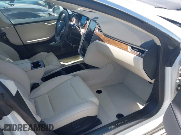 2017 Tesla Model S 100D with VIN 5YJSA1E20HF232570, listed as a IAAI auction lot 42037409 with 68,957 mi miles and . Bid and sale history available at DreamBid. Image 5.