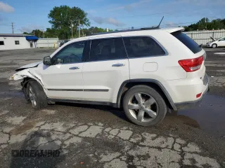 2013 Jeep Grand Cherokee Overland with VIN 1C4RJECG8DC526150, listed as a Copart auction lot 52038775 with 183,813 mi miles and Salvage Title. Bid and sale history available at DreamBid. Image 2.