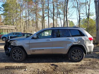 2016 Jeep Grand Cherokee Limited 75th Anniversary with VIN 1C4RJFBT9GC400873, listed as a IAAI auction lot 41834112 with 110,457 mi miles and . Bid and sale history available at DreamBid. Image 14.