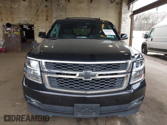 2015 Chevrolet Tahoe LT with VIN 1GNSKBKCXFR604401, listed as a IAAI auction lot 42048559 with 60,768 mi miles and . Bid and sale history available at DreamBid. Image 12.