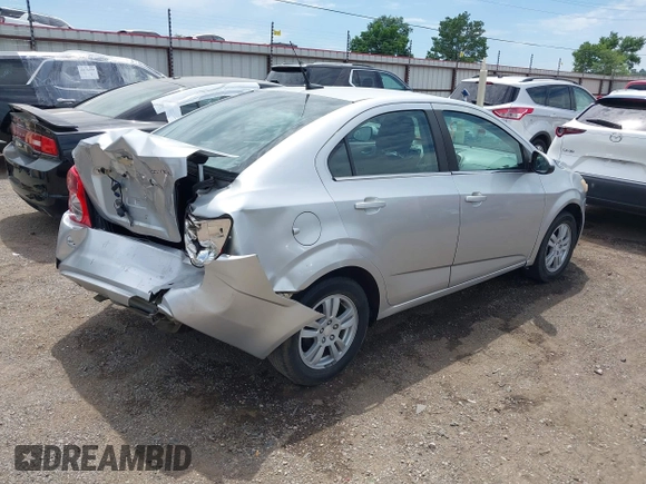 2014 Chevrolet Sonic LT z VIN 1G1JC5SH9E4159913, wystawiony jako IAAI lot #42253329 z przebiegiem 156 333 mil mil oraz . Historia ofert i sprzedaży dostępna na DreamBid. Obrazek 4.