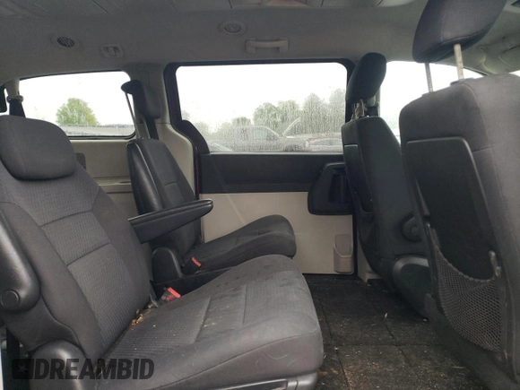 2010 Dodge Grand Caravan SXT z VIN 2D4RN5D10AR179773, wystawiony jako Copart lot #56855235 z przebiegiem 239 925 mil mil oraz Nie do naprawy • Non repairable. Historia ofert i sprzedaży dostępna na DreamBid. Obrazek 11.