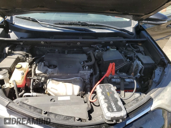 2018 Toyota RAV4 XLE with VIN 2T3WFREVXJW471443, listed as a Copart auction lot 54890655 with 131,677 mi miles and Salvage title. Bid and sale history available at DreamBid. Image 12.