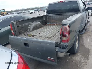 2002 GMC Sierra 1500 SLE z VIN 2GTEC19T121214213, wystawiony jako IAAI lot #41317517 z przebiegiem 209 031 mil mil oraz . Historia ofert i sprzedaży dostępna na DreamBid. Obrazek 16.