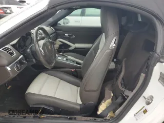 2015 Porsche Boxster z VIN WP0CA2A82FK110152, wystawiony jako Copart lot #76667714 z przebiegiem Nie podano mil oraz Nie do naprawy • Non repairable. Historia ofert i sprzedaży dostępna na DreamBid. Obrazek 7.