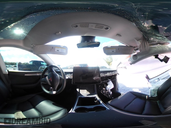 2023 Tesla Model Y Long Range with VIN 7SAYGAEE1PF665934, listed as a IAAI auction lot 41780949 with 21,949 mi miles and . Bid and sale history available at DreamBid. Image 17.