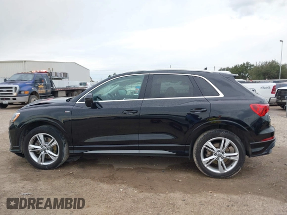 2020 Audi Q3 S line Premium z VIN WA1DECF34L1088002, wystawiony jako IAAI lot #41332352 z przebiegiem 41 196 mil mil oraz . Historia ofert i sprzedaży dostępna na DreamBid. Obrazek 14.
