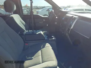 2014 Ford F-150 XL with VIN 1FTEW1CM9EFC50155, listed as a IAAI auction lot 41302506 with 212,439 mi miles. Bid and sale history available at carsss.com. Image 5.