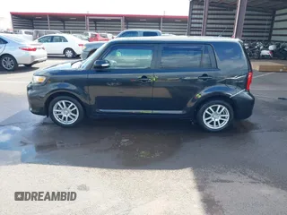 2014 Scion xB with VIN JTLZE4FE4EJ064549, listed as a IAAI auction lot 41392280 with 148,962 mi miles. Bid and sale history available at carsss.com. Image 14.