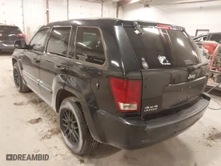2008 Jeep Grand Cherokee Laredo with VIN 1J8GR48K08C138979, listed as a IAAI auction lot 41081490 with 191,733 mi miles. Bid and sale history available at carsss.com. Image 3.