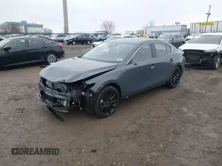 2025 Mazda 3 S Carbon Edition with VIN JM1BPBCM4S1760993, listed as a IAAI auction lot 41446098 with 102 mi miles and . Bid and sale history available at DreamBid. Image 2.