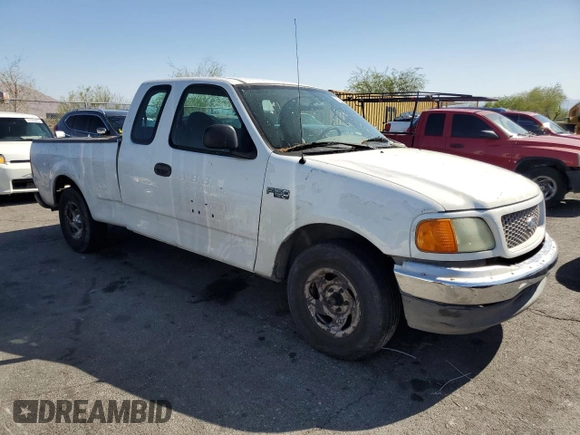 2004 Ford F-150 XL with VIN 2FTRX17204CA03494, listed as a Copart auction lot 59884165 with 226,973 mi miles and Salvage title. Bid and sale history available at DreamBid. Image 4.