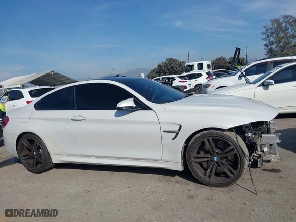 2015 BMW M4 with VIN WBS3R9C51FK331531, listed as a IAAI auction lot 41594263 with NaN miles. Bid and sale history available at carsss.com. Image 14.