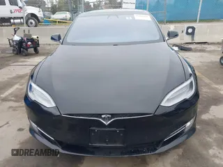 2018 Tesla Model S 75D with VIN 5YJSA1E42JF265691, listed as a IAAI auction lot 41886105 with 99,485 mi miles and . Bid and sale history available at DreamBid. Image 6.