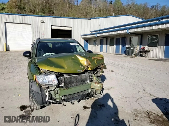 2012 Jeep Compass Latitude with VIN 1C4NJDEB6CD630669, listed as a Copart auction lot 52028235 with 124,123 mi miles and Salvage Title. Bid and sale history available at DreamBid. Image 12.