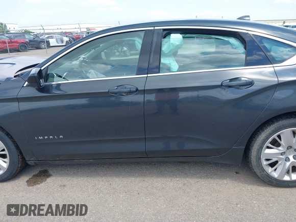 2014 Chevrolet Impala LS with VIN 1G11X5SL0EU164667, listed as a IAAI auction lot 42542110 with 150,458 mi miles and . Bid and sale history available at DreamBid. Image 14.