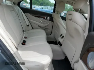 2018 Mercedes-Benz E 300 with VIN WDDZF4KBXJA337966, listed as a Copart auction lot 58718355 with 54,264 mi miles and Salvage title. Bid and sale history available at DreamBid. Image 10.