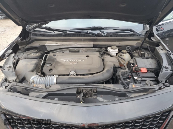 2023 Cadillac XT4 FWD Luxury with VIN 1GYAZAR45PF218684, listed as a Copart auction lot 46483515 with 74,920 mi miles and Salvage title. Bid and sale history available at DreamBid. Image 13.
