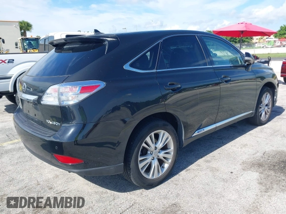 2010 Lexus RX 450h with VIN JTJZB1BAXA2002631, listed as a IAAI auction lot 42744998 with 118,851 mi miles and . Bid and sale history available at DreamBid. Image 4.