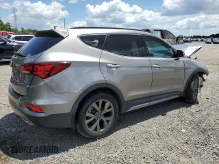 2017 Hyundai Santa Fe Ultimate z VIN 5XYZW4LA8HG491652, wystawiony jako Copart lot #56907985 z przebiegiem Nie podano mil oraz Szkoda całkowita • Salvage title. Historia ofert i sprzedaży dostępna na DreamBid. Obrazek 3.