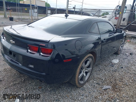 2012 Chevrolet Camaro 1LT z VIN 2G1FB1E3XC9165389, wystawiony jako IAAI lot #42126434 z przebiegiem 140 681 mil mil oraz . Historia ofert i sprzedaży dostępna na DreamBid. Obrazek 4.
