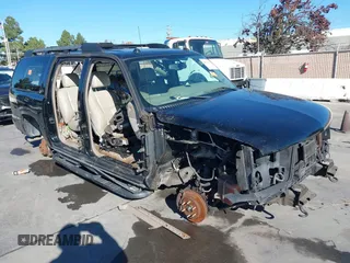 2004 Chevrolet Suburban Z71 with VIN 3GNFK16T34G158501, listed as a IAAI auction lot 40983927 with 1 mi miles. Bid and sale history available at carsss.com. Image 1.