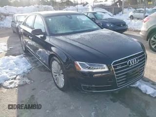 2015 Audi A8 L 4.0T with VIN WAU32AFD0FN035282, listed as a IAAI auction lot 41515136 with 76,518 mi miles. Bid and sale history available at carsss.com. Image 1.