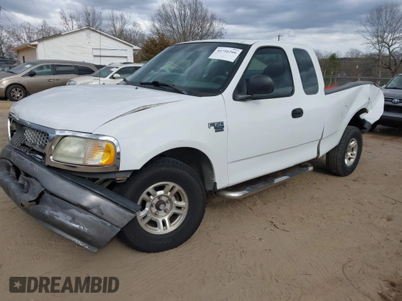 2003 Ford F-150 XL with VIN 1FTRX17W23NA71890, listed as a IAAI auction lot 41716266 with 1 mi miles. Bid and sale history available at carsss.com. Image 2.