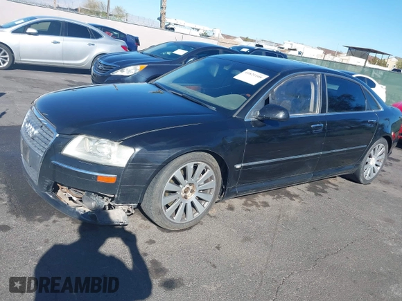 2006 Audi A8 4.2L z VIN WAUML44E96N013151, wystawiony jako IAAI lot #41821108 z przebiegiem 150 334 mil mil oraz . Historia ofert i sprzedaży dostępna na DreamBid. Obrazek 12.