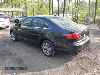 2015 Volkswagen Jetta SE z VIN 3VWD07AJ1FM277499, wystawiony jako IAAI lot #42085122 z przebiegiem 122 754 mil mil oraz . Historia ofert i sprzedaży dostępna na DreamBid. Obrazek 3.